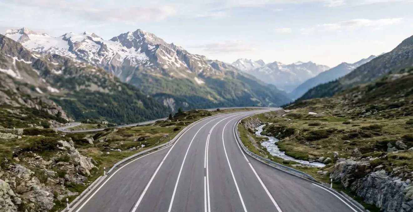 Vue aérienne minimaliste d'une autoroute suisse avec marquages au sol illustrant la complexité du partage de responsabilité